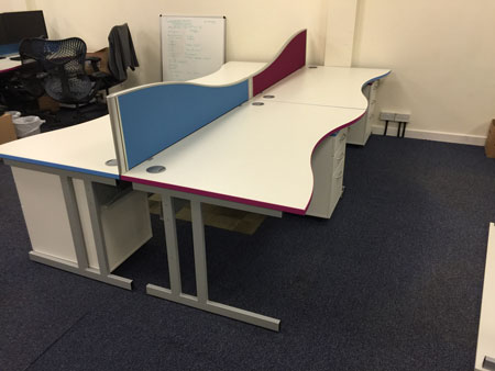 desks trimmed in company colours